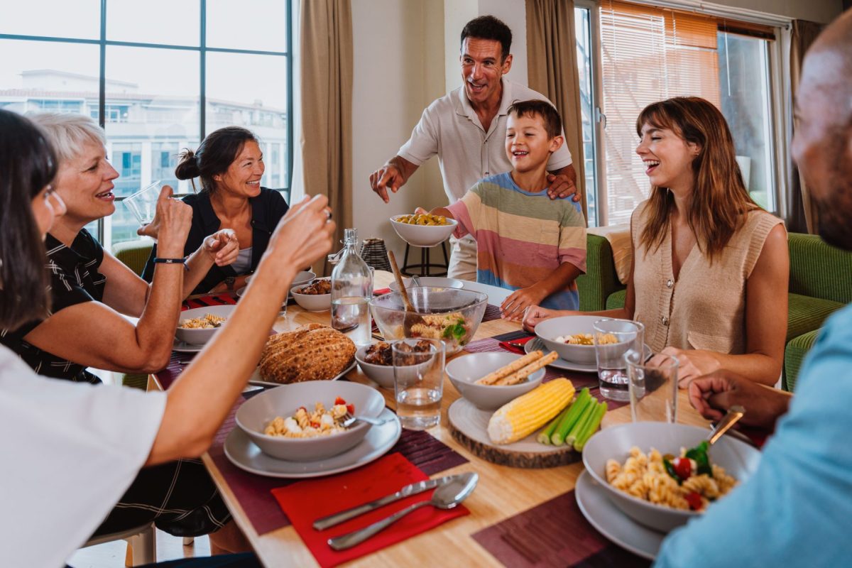 multi-generational family eating at a dining table
